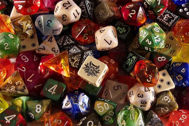 dice, game, role playing game, dice, dice, dice, dice, dice. Planning a gaming creator business where every channel has one job